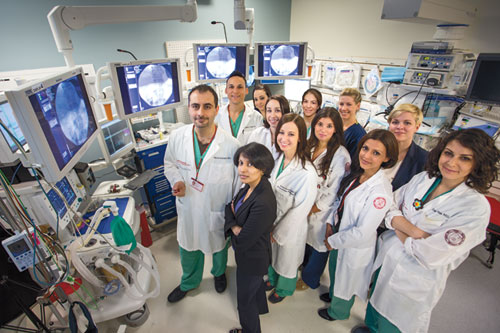 Dr. Michel Kahaleh (far left) with colleagues in an endoscopy suite