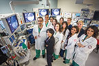 Photo: Dr. Michel Kahaleh (far left) with colleagues in an endoscopy suite